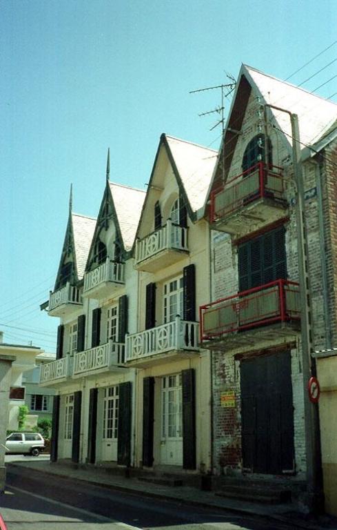 Maison à quatre unités d'habitation